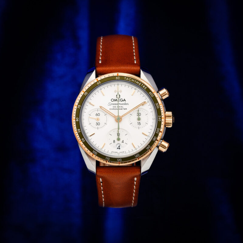 Omega Speedmaster 38 in steel and yellow gold on a brown leather strap